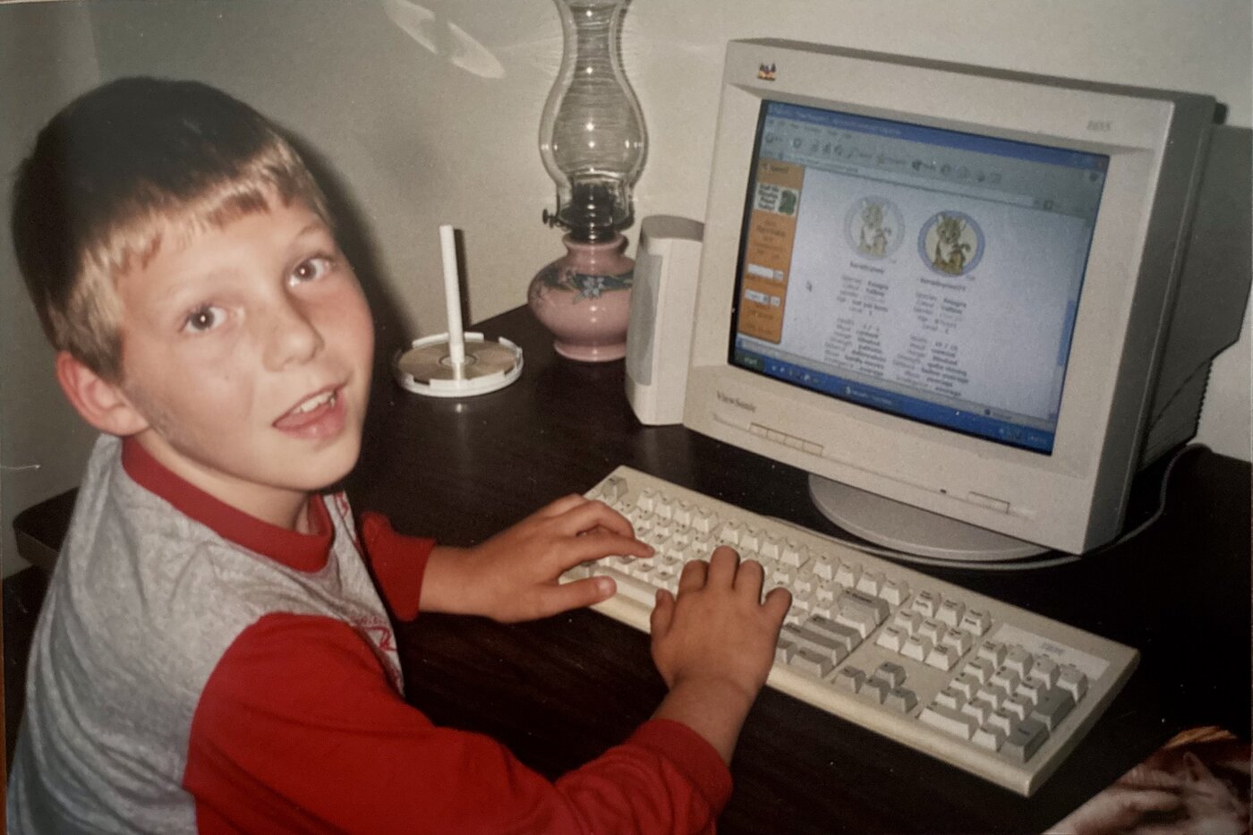 Young Jared at a computer — already building things online before social media was an industry
